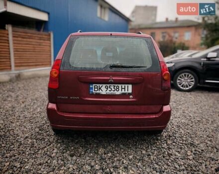 Міцубісі Спейс Стар 2004 у Бердичеве на Automoto.ua Червоний Міцубісі Спейс Стар, об'ємом двигуна 1.6 л та пробігом 200 тис. км за 2700 $, фото 3 на Automoto.ua