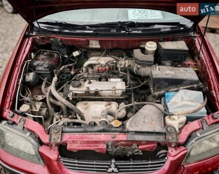 Міцубісі Спейс Стар 2004 у Бердичеве на Automoto.ua Червоний Міцубісі Спейс Стар, об'ємом двигуна 1.6 л та пробігом 200 тис. км за 2700 $, фото 18 на Automoto.ua