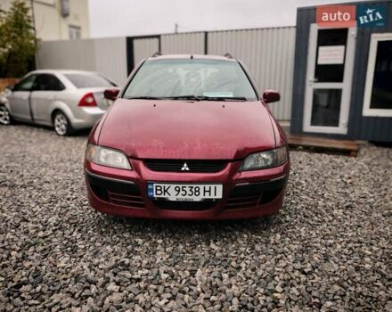 Міцубісі Спейс Стар 2004 у Бердичеве на Automoto.ua Червоний Міцубісі Спейс Стар, об'ємом двигуна 1.6 л та пробігом 200 тис. км за 2700 $, фото 4 на Automoto.ua