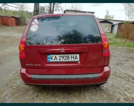 Красный Мицубиси Спейс Стар, объемом двигателя 1.6 л и пробегом 300 тыс. км за 2799 $, фото 2 на Automoto.ua