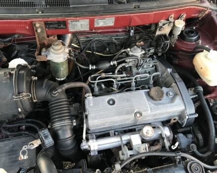 Красный Мицубиси Спейс Стар, объемом двигателя 2 л и пробегом 400 тыс. км за 900 $, фото 8 на Automoto.ua