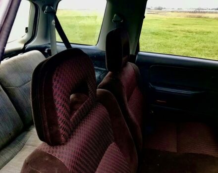 Красный Мицубиси Спейс Стар, объемом двигателя 2 л и пробегом 400 тыс. км за 900 $, фото 5 на Automoto.ua