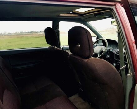 Красный Мицубиси Спейс Стар, объемом двигателя 2 л и пробегом 400 тыс. км за 900 $, фото 4 на Automoto.ua