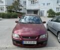 Красный Мицубиси Спейс Стар, объемом двигателя 1.6 л и пробегом 214 тыс. км за 5491 $, фото 1 на Automoto.ua