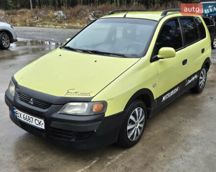 Желтый Мицубиси Спейс Стар, объемом двигателя 1.58 л и пробегом 245 тыс. км за 2250 $, фото 1 на Automoto.ua