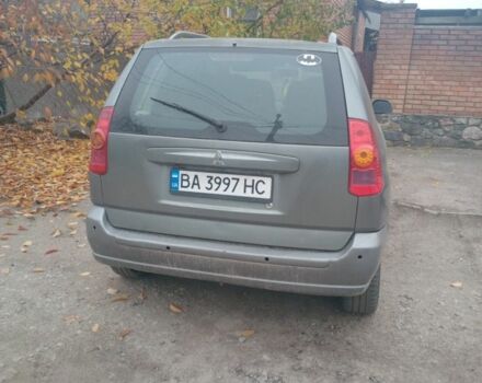 Серый Мицубиси Спейс Стар, объемом двигателя 1.6 л и пробегом 390 тыс. км за 1700 $, фото 2 на Automoto.ua