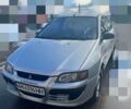 Серый Мицубиси Спейс Стар, объемом двигателя 1.58 л и пробегом 318 тыс. км за 2800 $, фото 1 на Automoto.ua