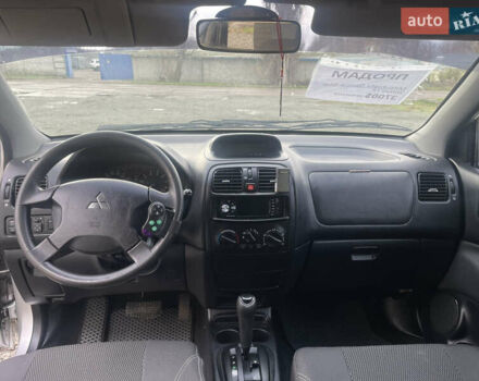 Серый Мицубиси Спейс Стар, объемом двигателя 1.58 л и пробегом 180 тыс. км за 3700 $, фото 6 на Automoto.ua