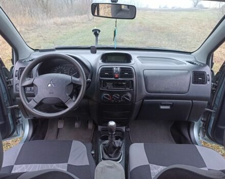 Серый Мицубиси Спейс Стар, объемом двигателя 1.6 л и пробегом 220 тыс. км за 2550 $, фото 11 на Automoto.ua