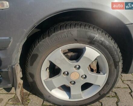 Серый Мицубиси Спейс Стар, объемом двигателя 1.6 л и пробегом 204 тыс. км за 1500 $, фото 10 на Automoto.ua