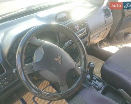Серый Мицубиси Спейс Стар, объемом двигателя 1.6 л и пробегом 204 тыс. км за 1500 $, фото 6 на Automoto.ua