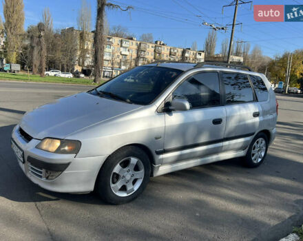 Сірий Міцубісі Спейс Стар, об'ємом двигуна 1.6 л та пробігом 200 тис. км за 1999 $, фото 1 на Automoto.ua