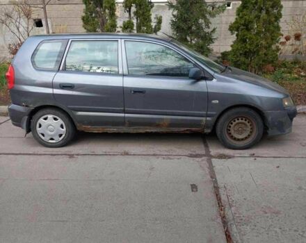 Серый Мицубиси Спейс Стар, объемом двигателя 1.6 л и пробегом 170 тыс. км за 1350 $, фото 1 на Automoto.ua