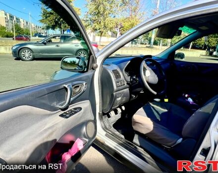 Серый Мицубиси Спейс Стар, объемом двигателя 1.6 л и пробегом 283 тыс. км за 3300 $, фото 4 на Automoto.ua