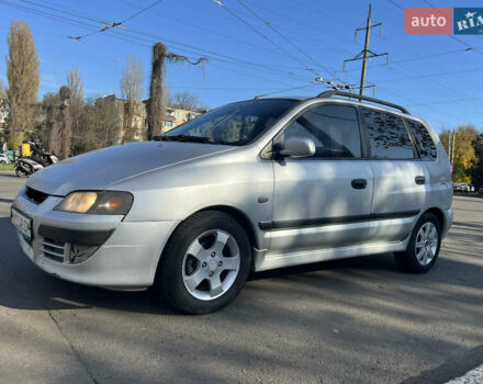 Сірий Міцубісі Спейс Стар, об'ємом двигуна 1.6 л та пробігом 200 тис. км за 1999 $, фото 2 на Automoto.ua