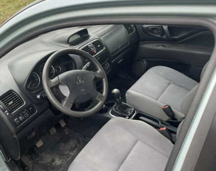 Сірий Міцубісі Спейс Стар, об'ємом двигуна 1.58 л та пробігом 295 тис. км за 2750 $, фото 11 на Automoto.ua