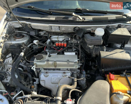 Сірий Міцубісі Спейс Стар, об'ємом двигуна 1.6 л та пробігом 200 тис. км за 1999 $, фото 12 на Automoto.ua