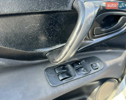 Сірий Міцубісі Спейс Стар, об'ємом двигуна 1.6 л та пробігом 200 тис. км за 1999 $, фото 8 на Automoto.ua