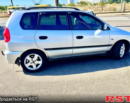 Серый Мицубиси Спейс Стар, объемом двигателя 1.6 л и пробегом 283 тыс. км за 3300 $, фото 1 на Automoto.ua