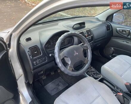 Сірий Міцубісі Спейс Стар, об'ємом двигуна 1.58 л та пробігом 250 тис. км за 2800 $, фото 9 на Automoto.ua