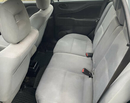 Сірий Міцубісі Спейс Стар, об'ємом двигуна 1.58 л та пробігом 295 тис. км за 2750 $, фото 10 на Automoto.ua