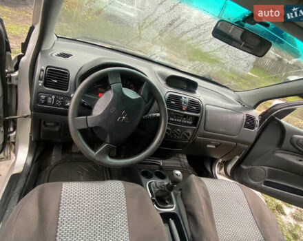 Сірий Міцубісі Спейс Стар, об'ємом двигуна 1.58 л та пробігом 300 тис. км за 2450 $, фото 13 на Automoto.ua