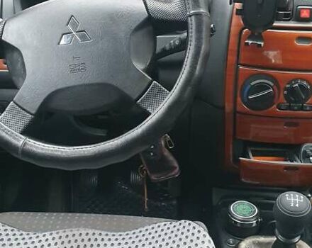 Сірий Міцубісі Спейс Стар, об'ємом двигуна 1.6 л та пробігом 208 тис. км за 3550 $, фото 20 на Automoto.ua
