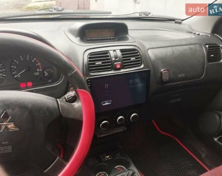 Серый Мицубиси Спейс Стар, объемом двигателя 1.6 л и пробегом 222 тыс. км за 3600 $, фото 7 на Automoto.ua
