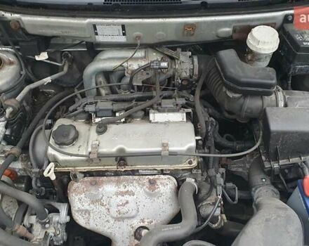 Сірий Міцубісі Спейс Стар, об'ємом двигуна 1.6 л та пробігом 208 тис. км за 3550 $, фото 25 на Automoto.ua