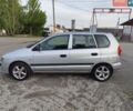 Серый Мицубиси Спейс Стар, объемом двигателя 1.6 л и пробегом 300 тыс. км за 1800 $, фото 1 на Automoto.ua