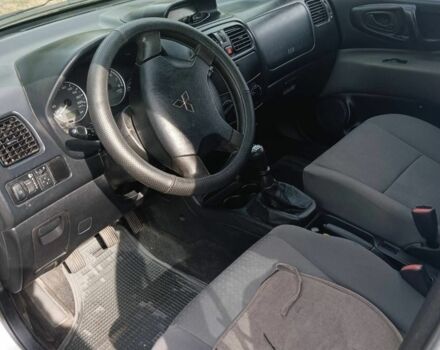 Серый Мицубиси Спейс Стар, объемом двигателя 1.6 л и пробегом 2 тыс. км за 4000 $, фото 5 на Automoto.ua