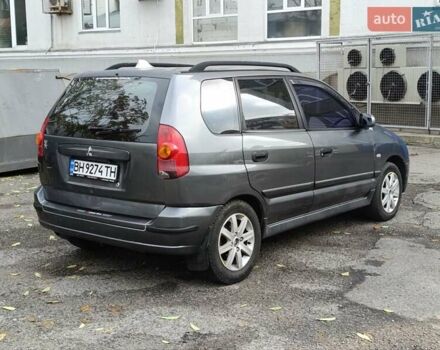 Серый Мицубиси Спейс Стар, объемом двигателя 1.6 л и пробегом 227 тыс. км за 2600 $, фото 3 на Automoto.ua