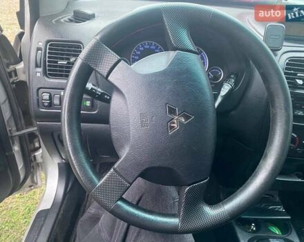 Серый Мицубиси Спейс Стар, объемом двигателя 1.6 л и пробегом 151 тыс. км за 2300 $, фото 11 на Automoto.ua