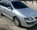 Серый Мицубиси Спейс Стар, объемом двигателя 1.58 л и пробегом 265 тыс. км за 3700 $, фото 1 на Automoto.ua