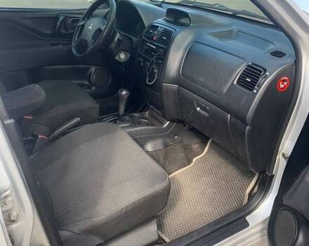 Серый Мицубиси Спейс Стар, объемом двигателя 1.58 л и пробегом 265 тыс. км за 3700 $, фото 7 на Automoto.ua