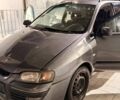 Серый Мицубиси Спейс Стар, объемом двигателя 1.58 л и пробегом 240 тыс. км за 3000 $, фото 1 на Automoto.ua