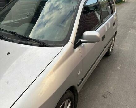 Сірий Міцубісі Спейс Стар, об'ємом двигуна 1.6 л та пробігом 253 тис. км за 4000 $, фото 1 на Automoto.ua