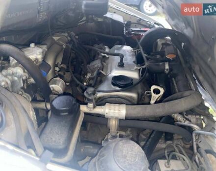 Серый Мицубиси Спейс Стар, объемом двигателя 1.6 л и пробегом 151 тыс. км за 2300 $, фото 19 на Automoto.ua