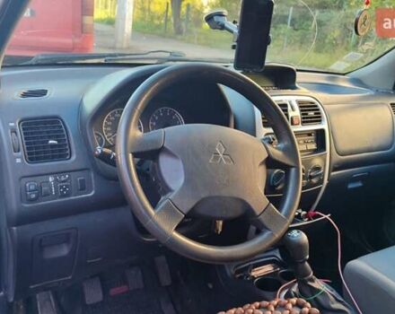 Серый Мицубиси Спейс Стар, объемом двигателя 1.3 л и пробегом 210 тыс. км за 2999 $, фото 3 на Automoto.ua