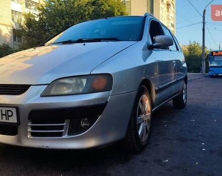 Серый Мицубиси Спейс Стар, объемом двигателя 1.3 л и пробегом 210 тыс. км за 2999 $, фото 1 на Automoto.ua