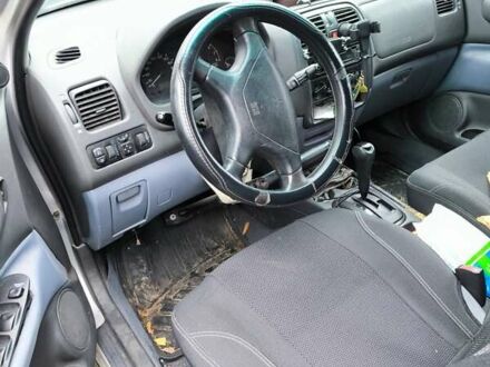 Сірий Міцубісі Спейс Стар, об'ємом двигуна 1.6 л та пробігом 430 тис. км за 2354 $, фото 1 на Automoto.ua