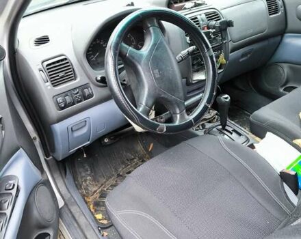 Серый Мицубиси Спейс Стар, объемом двигателя 1.6 л и пробегом 430 тыс. км за 2354 $, фото 1 на Automoto.ua