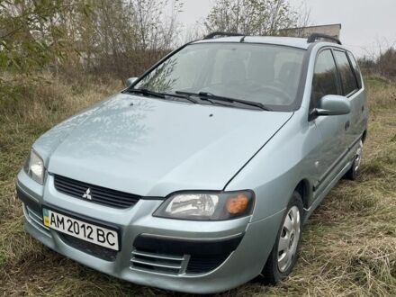 Серый Мицубиси Спейс Стар, объемом двигателя 1.6 л и пробегом 295 тыс. км за 2750 $, фото 1 на Automoto.ua