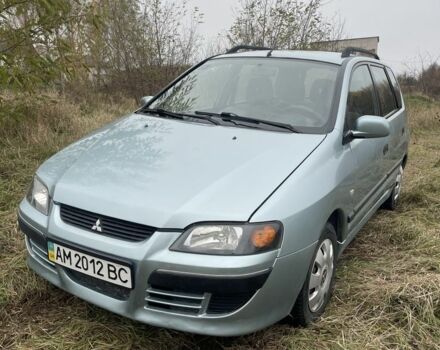 Серый Мицубиси Спейс Стар, объемом двигателя 1.6 л и пробегом 295 тыс. км за 2750 $, фото 1 на Automoto.ua