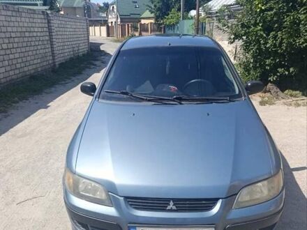 Мицубиси Спейс Стар 2003 в Новомосковске на Automoto.ua Серый Мицубиси Спейс Стар, объемом двигателя 1.3 л и пробегом 164 тыс. км за 2900 $, фото 1 на Automoto.ua