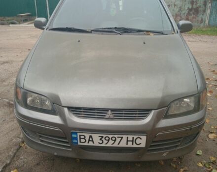 Серый Мицубиси Спейс Стар, объемом двигателя 1.6 л и пробегом 390 тыс. км за 1700 $, фото 1 на Automoto.ua