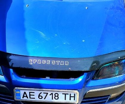 Синий Мицубиси Спейс Стар, объемом двигателя 1.6 л и пробегом 240 тыс. км за 2300 $, фото 1 на Automoto.ua