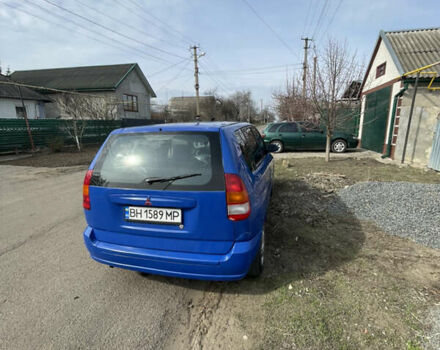 Синий Мицубиси Спейс Стар, объемом двигателя 1.3 л и пробегом 318 тыс. км за 2400 $, фото 9 на Automoto.ua