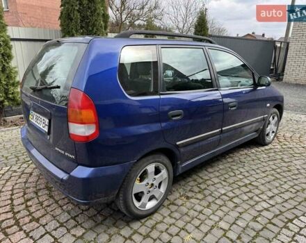 Синий Мицубиси Спейс Стар, объемом двигателя 1.58 л и пробегом 381 тыс. км за 2600 $, фото 2 на Automoto.ua