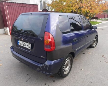 Синий Мицубиси Спейс Стар, объемом двигателя 1.6 л и пробегом 260 тыс. км за 2700 $, фото 2 на Automoto.ua